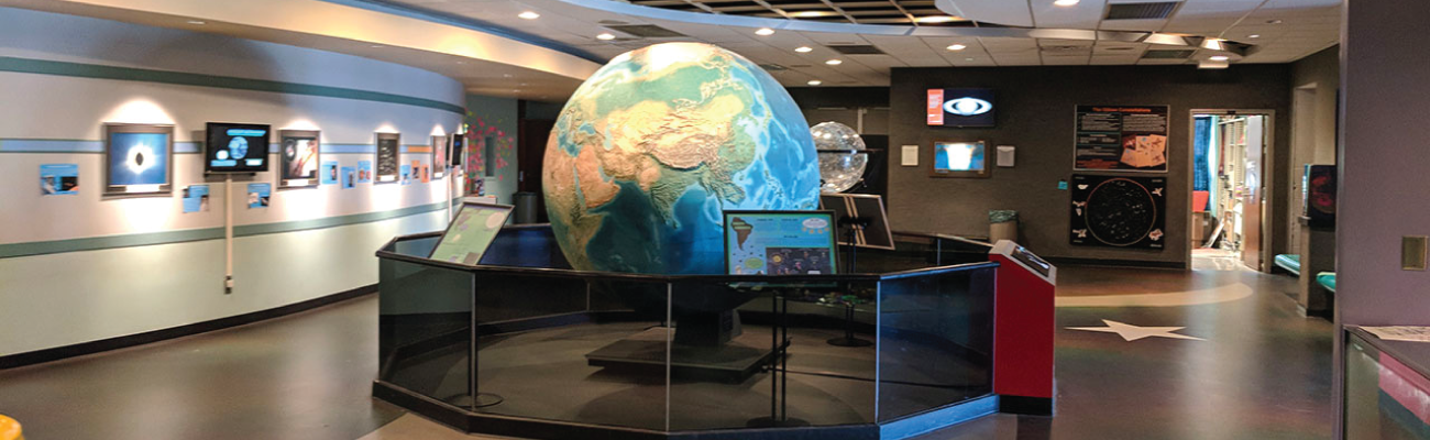 Inside of Planetarium looking at large globe